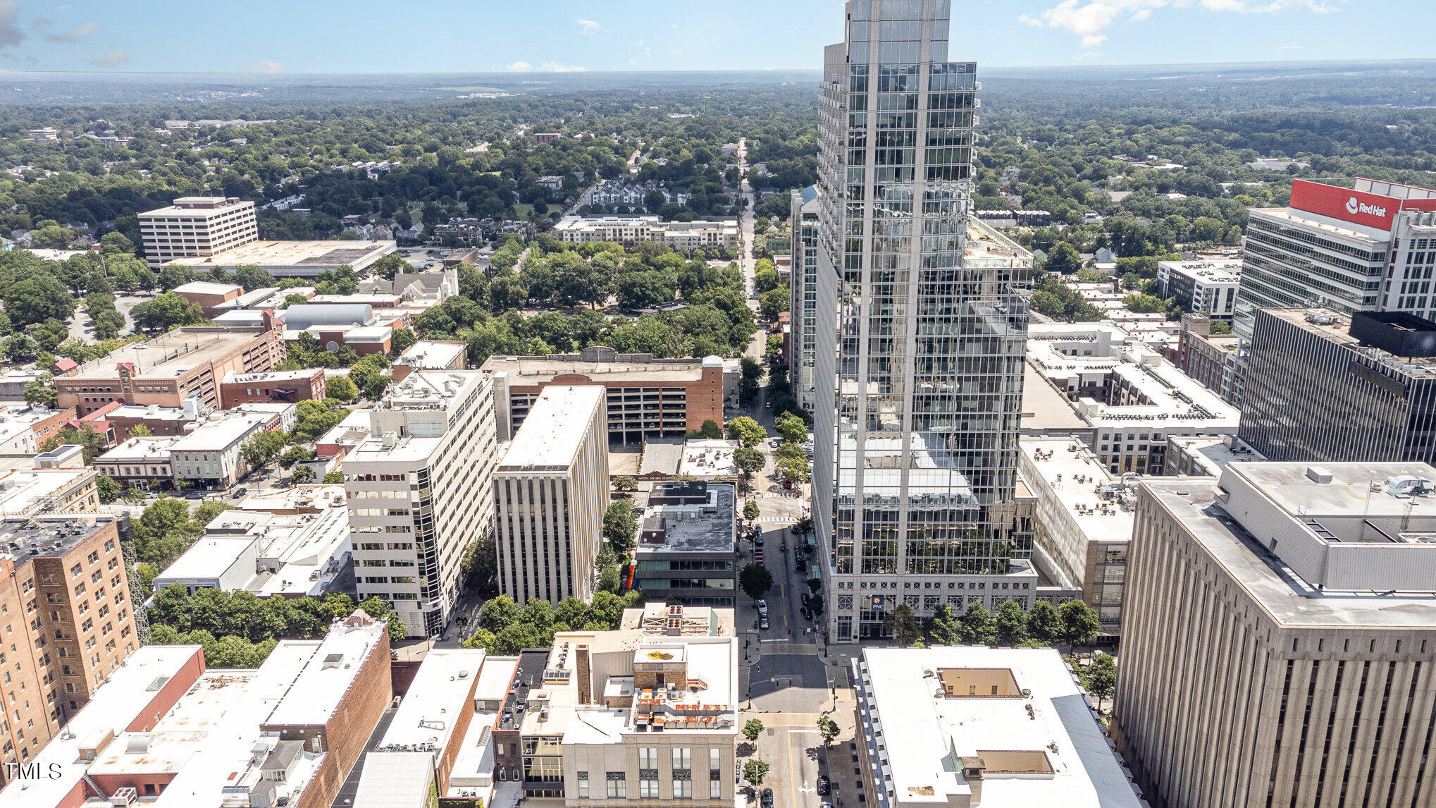 301 Fayetteville Street, Unit 2701 Raleigh, NC 27601 - Photo 26 of 26 a view of a city with tall buildings