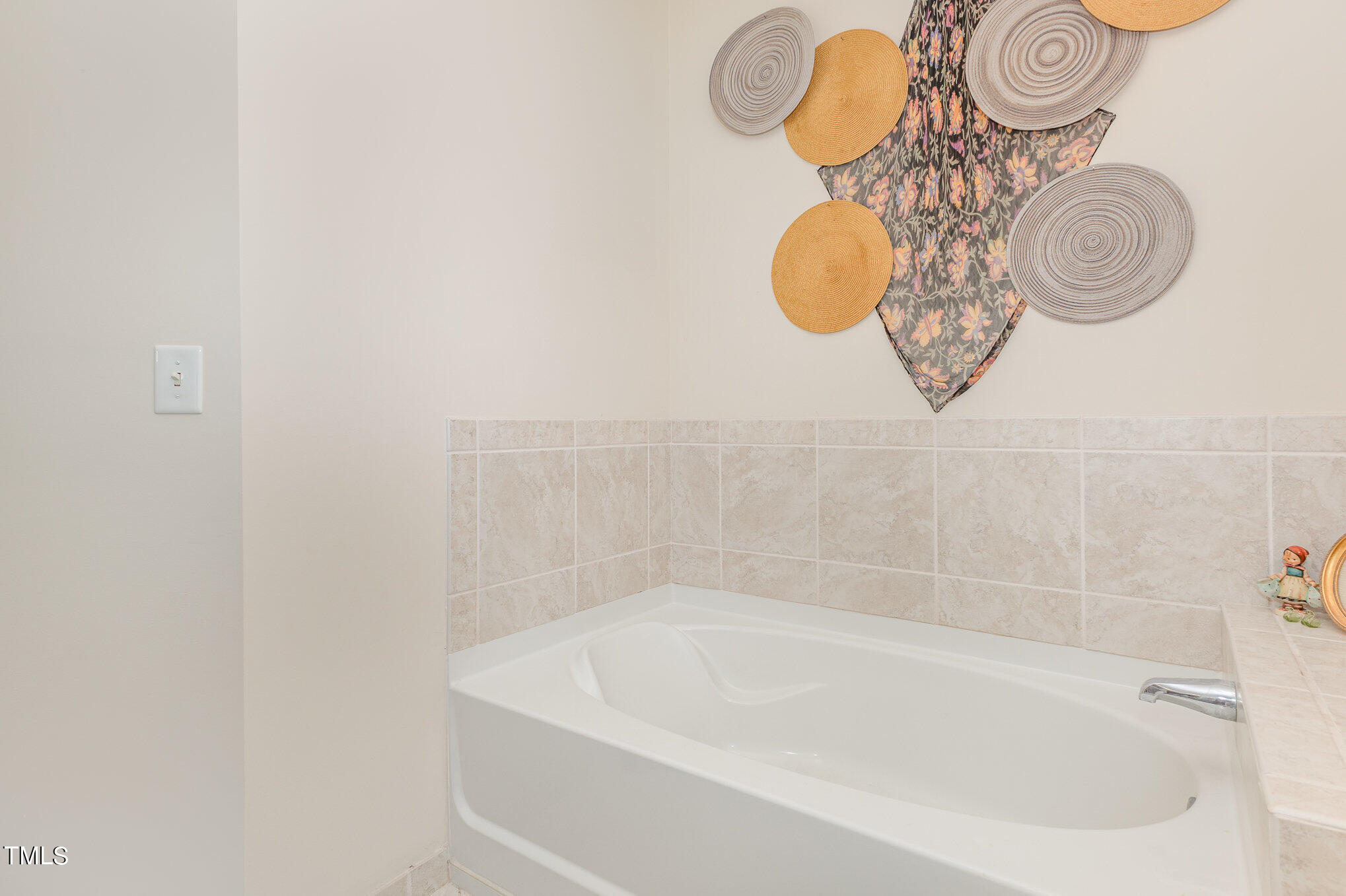 301 Fayetteville Street, Unit 2701 Raleigh, NC 27601 - Photo 10 of 26 a close up of a bathtub in a bathroom
