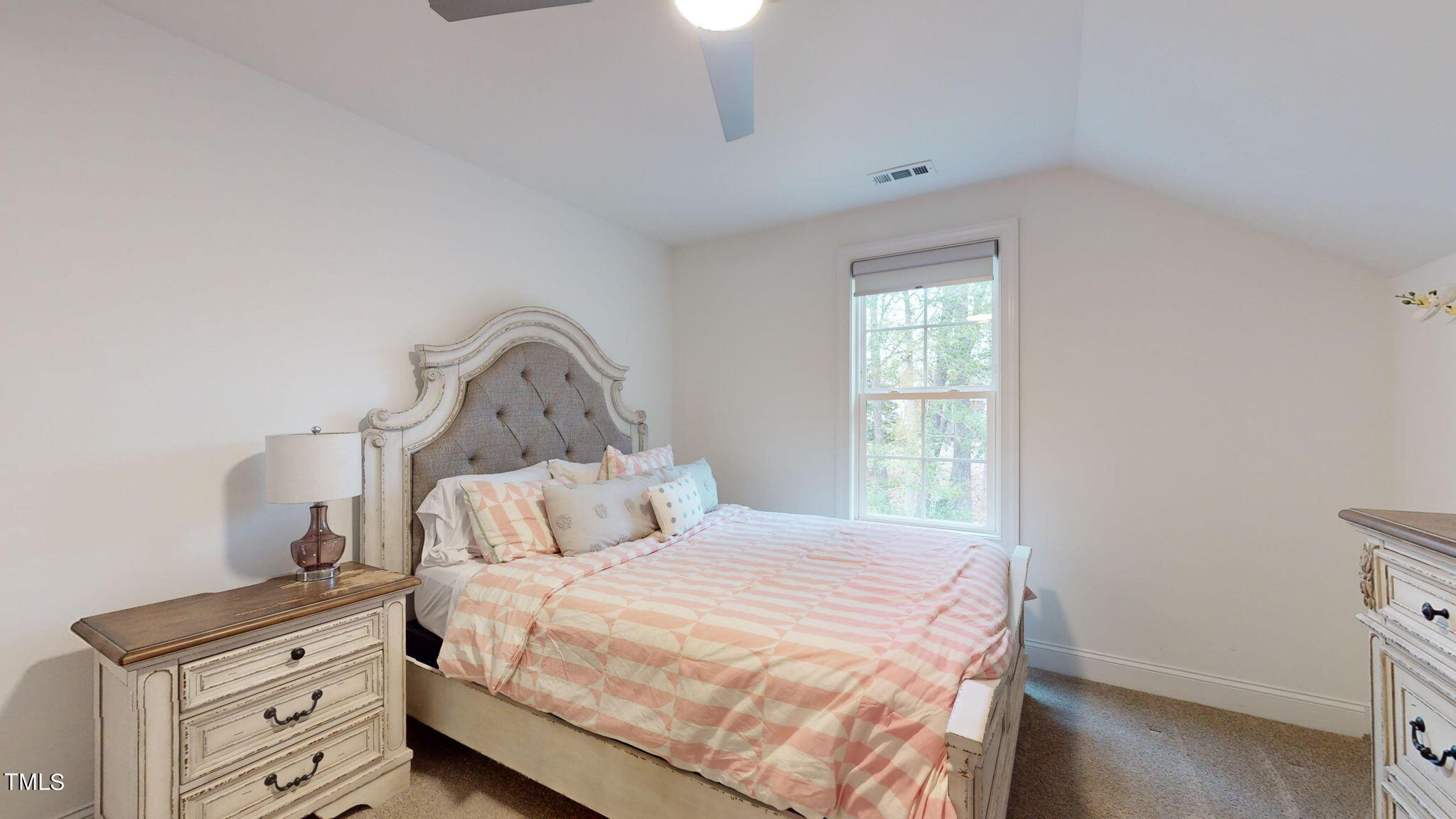 3000 New Watkins Lane Raleigh, NC 27616 - Photo 23 of 33 a bedroom with a bed and a window