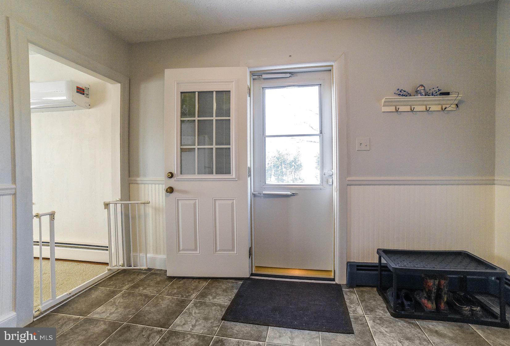 23235 Colton Point Road Avenue, MD 20609 - Photo 11 of 40 Den with access to back door to small deck