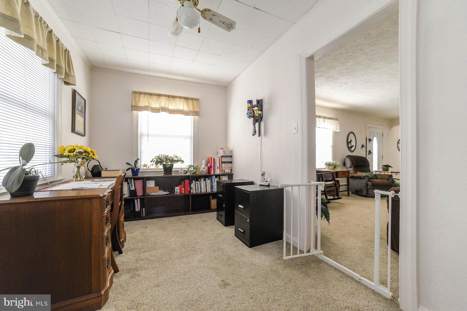 23235 Colton Point Road Avenue, MD 20609 - Photo 9 of 40 Den adjacent to living room