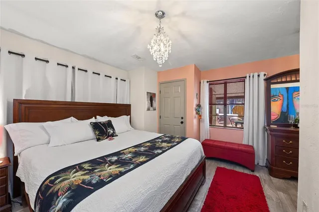 a utility room with stainless steel appliances granite countertop a sink and dishwasher