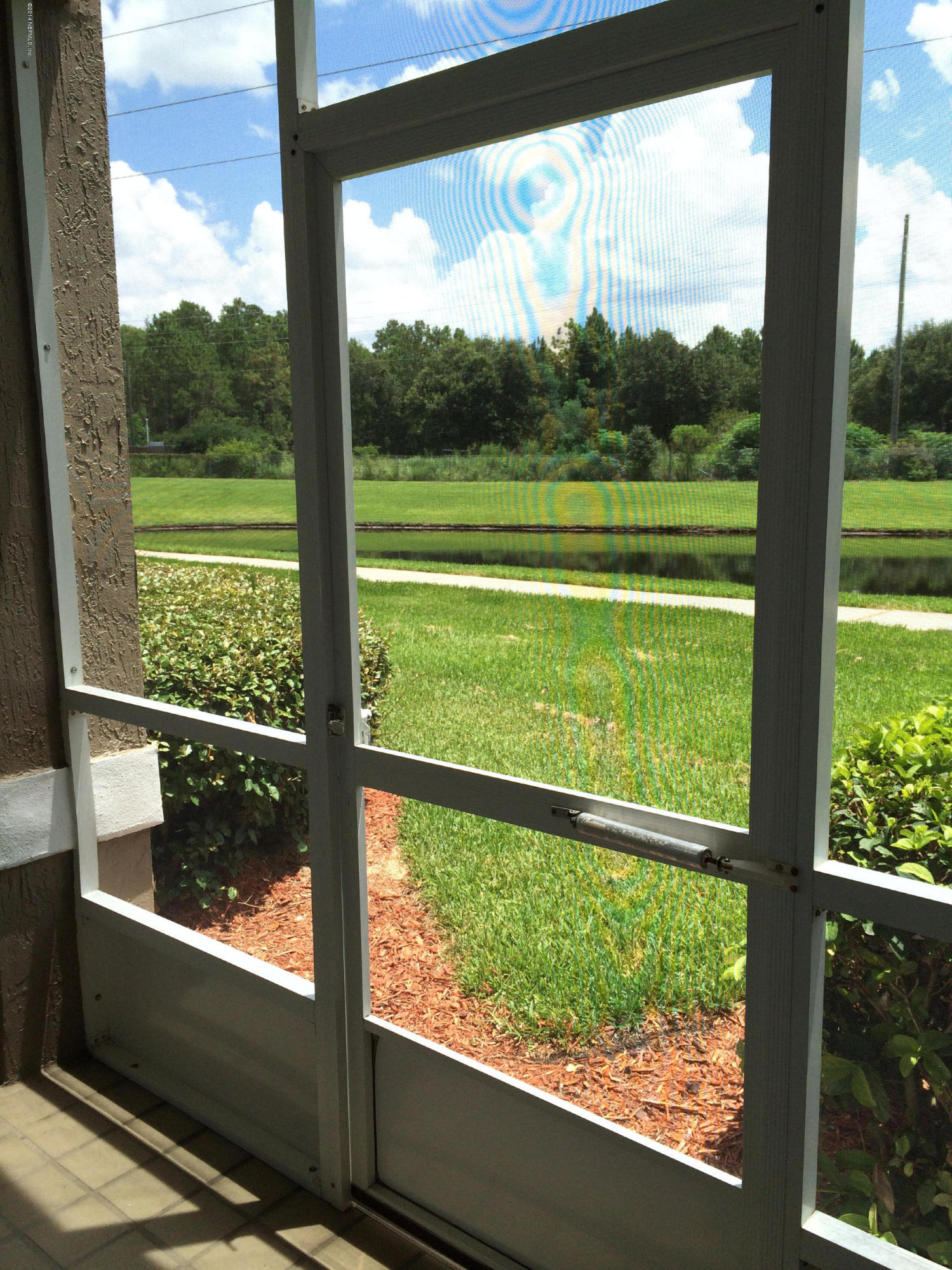 10550 Baymeadows Road, Unit 704 Jacksonville, FL 32256 - Photo 13 of 14 Quaint screened-in porch