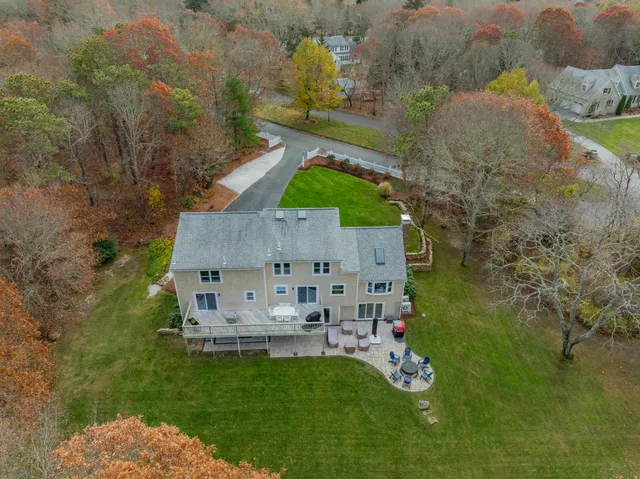 an aerial view of a house with a garden