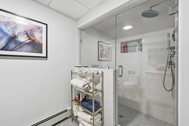 a view of a house with backyard sitting area and garden