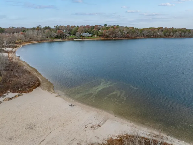 a view of a golf course with a lake