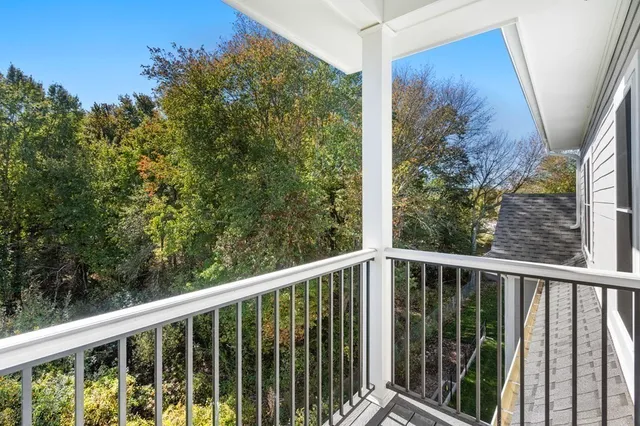 a view of a balcony with an outdoor space