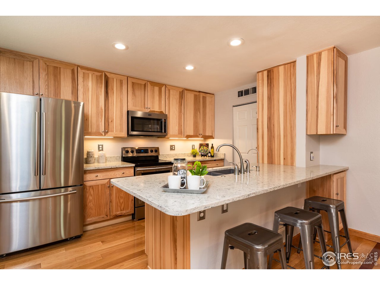 5070 Buckingham Road Boulder, CO 80301 - Photo 8 of 17 Kitchen with stainless steel appliances and Bosh Dishwasher
