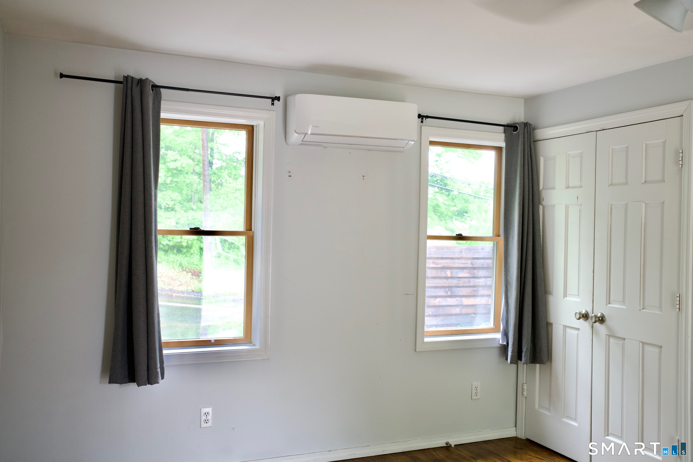 259 Peck Hill Road Woodbridge, CT 06525 - Photo 21 of 32 a view of an empty room with a window