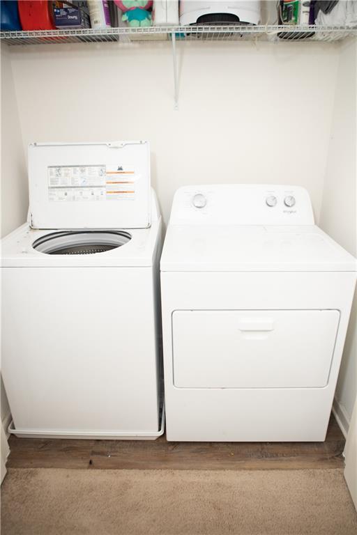 11900 Fuller Street Hampton, GA 30228 - Photo 10 of 17 a utility room with dryer and washer