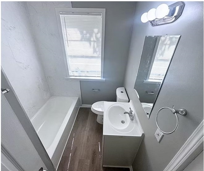 3101 Sunrise Street Memphis, TN 38127 - Photo 7 of 7 a bathroom with a sink a toilet and shower