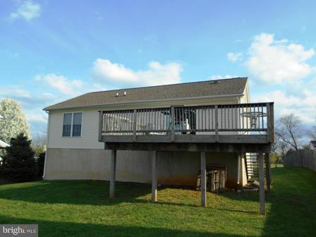 26 Robelei Drive Ranson, WV 25438 - Photo 2 of 18 a view of house with yard entertaining space and trampoline