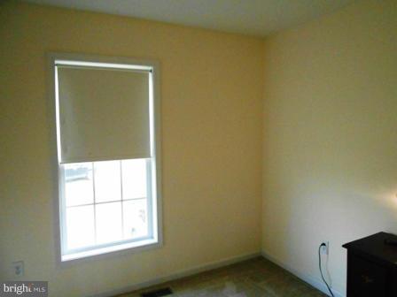 26 Robelei Drive Ranson, WV 25438 - Photo 11 of 18 an empty room with a window