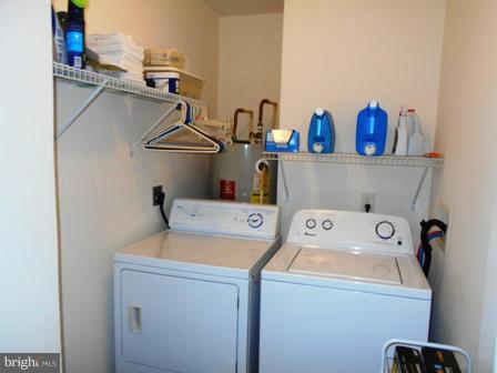26 Robelei Drive Ranson, WV 25438 - Photo 12 of 18 a utility room with dryer and washer