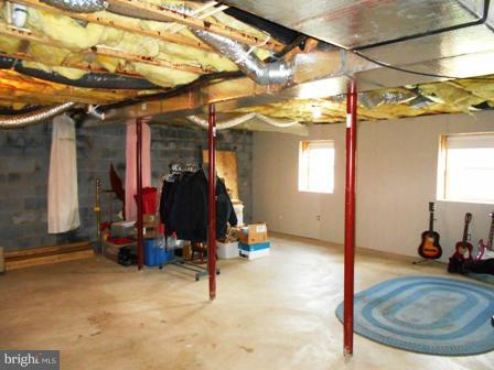 26 Robelei Drive Ranson, WV 25438 - Photo 16 of 18 a view of a room with gym equipment