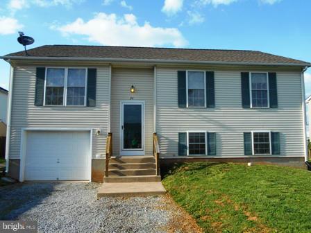 26 Robelei Drive Ranson, WV 25438 - Photo 18 of 18 a front view of a house with a yard