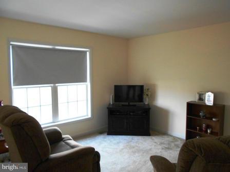 26 Robelei Drive Ranson, WV 25438 - Photo 6 of 18 a living room with furniture and a flat screen tv
