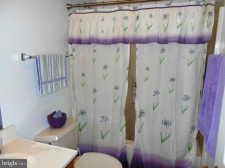 26 Robelei Drive Ranson, WV 25438 - Photo 8 of 18 a bathroom with a sink toilet and shower