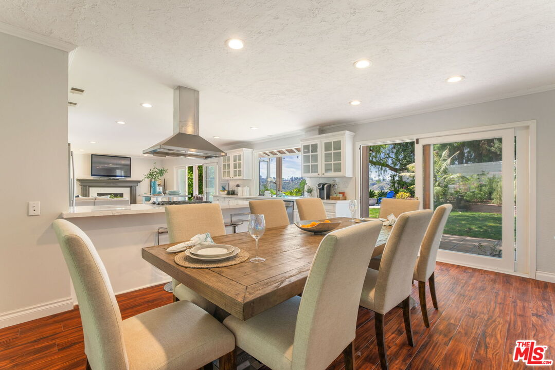 2829 Bottlebrush Drive Los Angeles, CA 90077 - Photo 28 of 40 a view of a dining room with furniture window and wooden floor