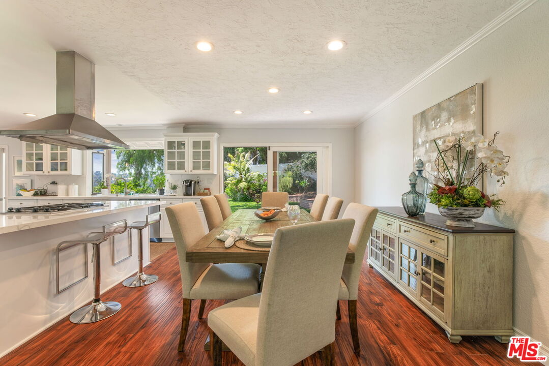 2829 Bottlebrush Drive Los Angeles, CA 90077 - Photo 8 of 40 a view of a dining room with furniture window and wooden floor