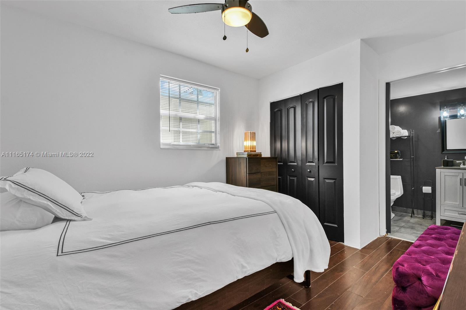 4722 Southwest 5th Street Miami, FL 33134 - Photo 31 of 36 a bedroom with a bed and window