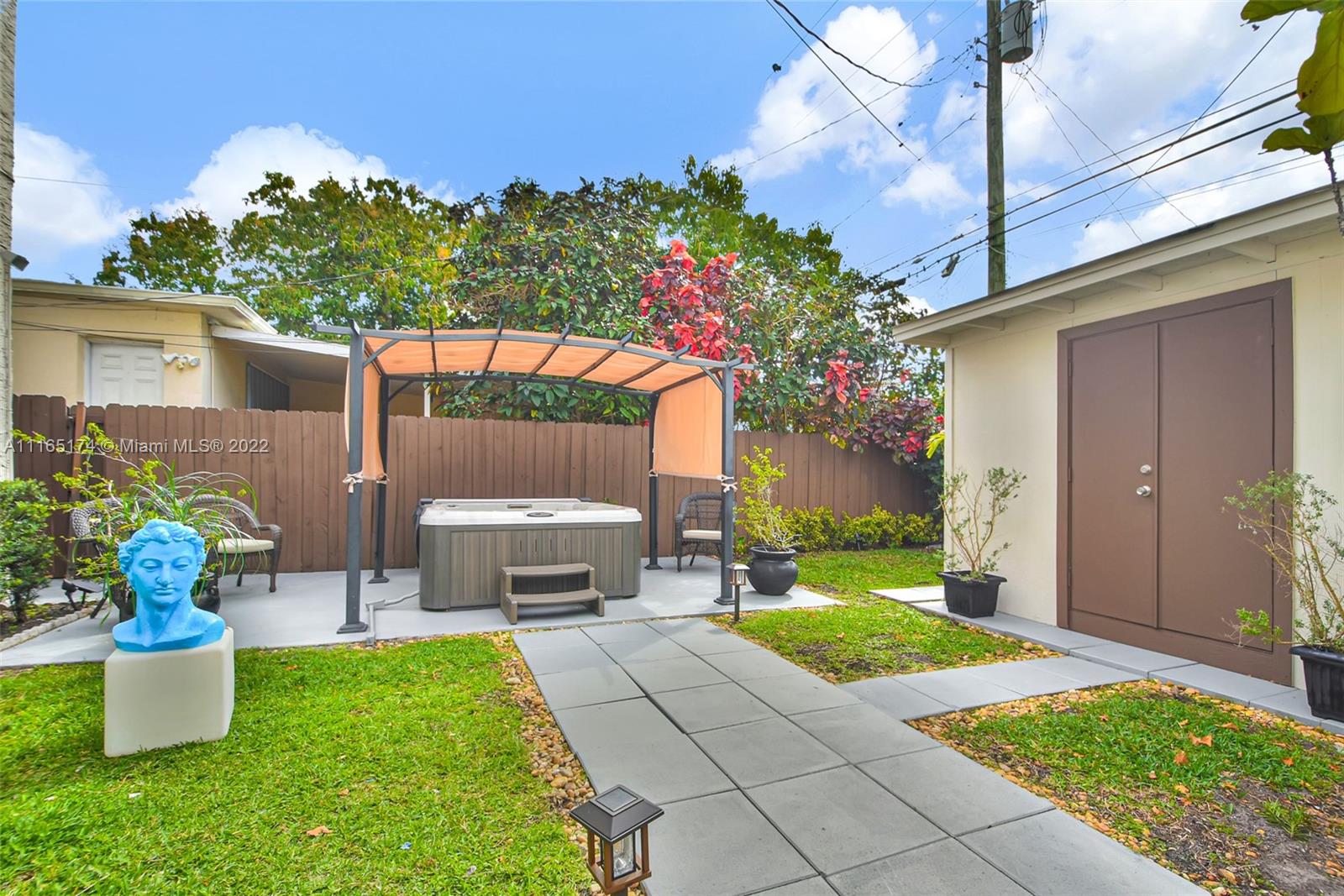 4722 Southwest 5th Street Miami, FL 33134 - Photo 33 of 36 a front view of a house with garden