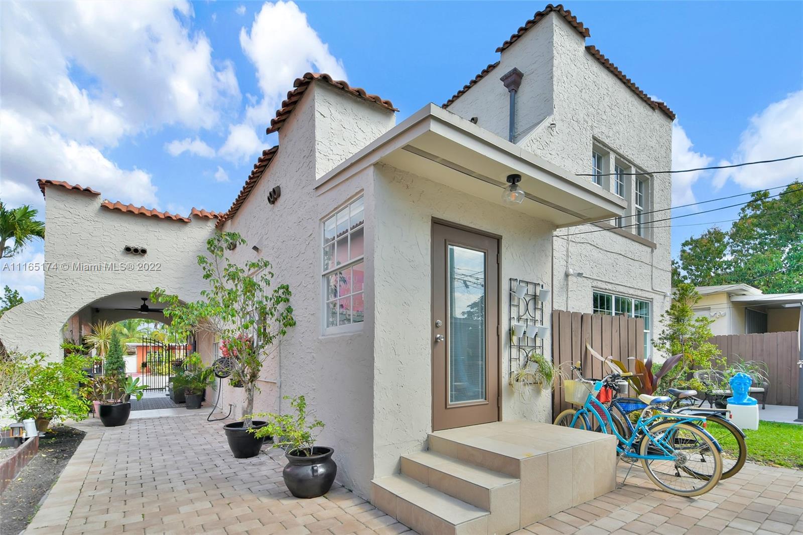 4722 Southwest 5th Street Miami, FL 33134 - Photo 35 of 36 a view of a patio with potted plants