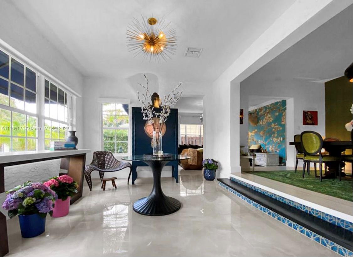 4722 Southwest 5th Street Miami, FL 33134 - Photo 4 of 36 a living room with furniture and a potted plant