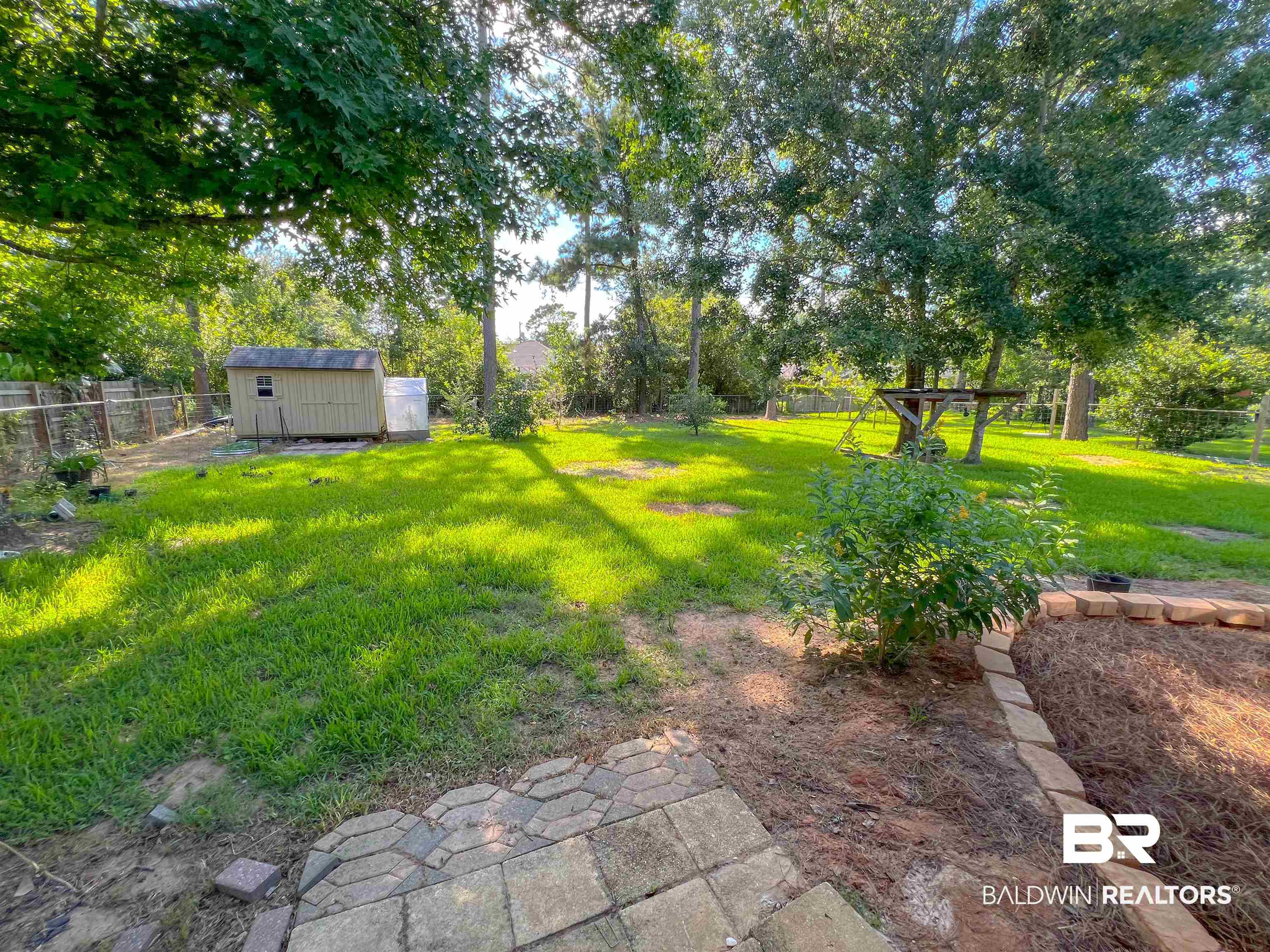 1200 South Juniper Street Foley, AL 36535 - Photo 23 of 23 View of yard with a storage unit