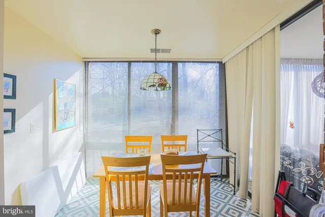 a bathroom with a sink a mirror and a shower