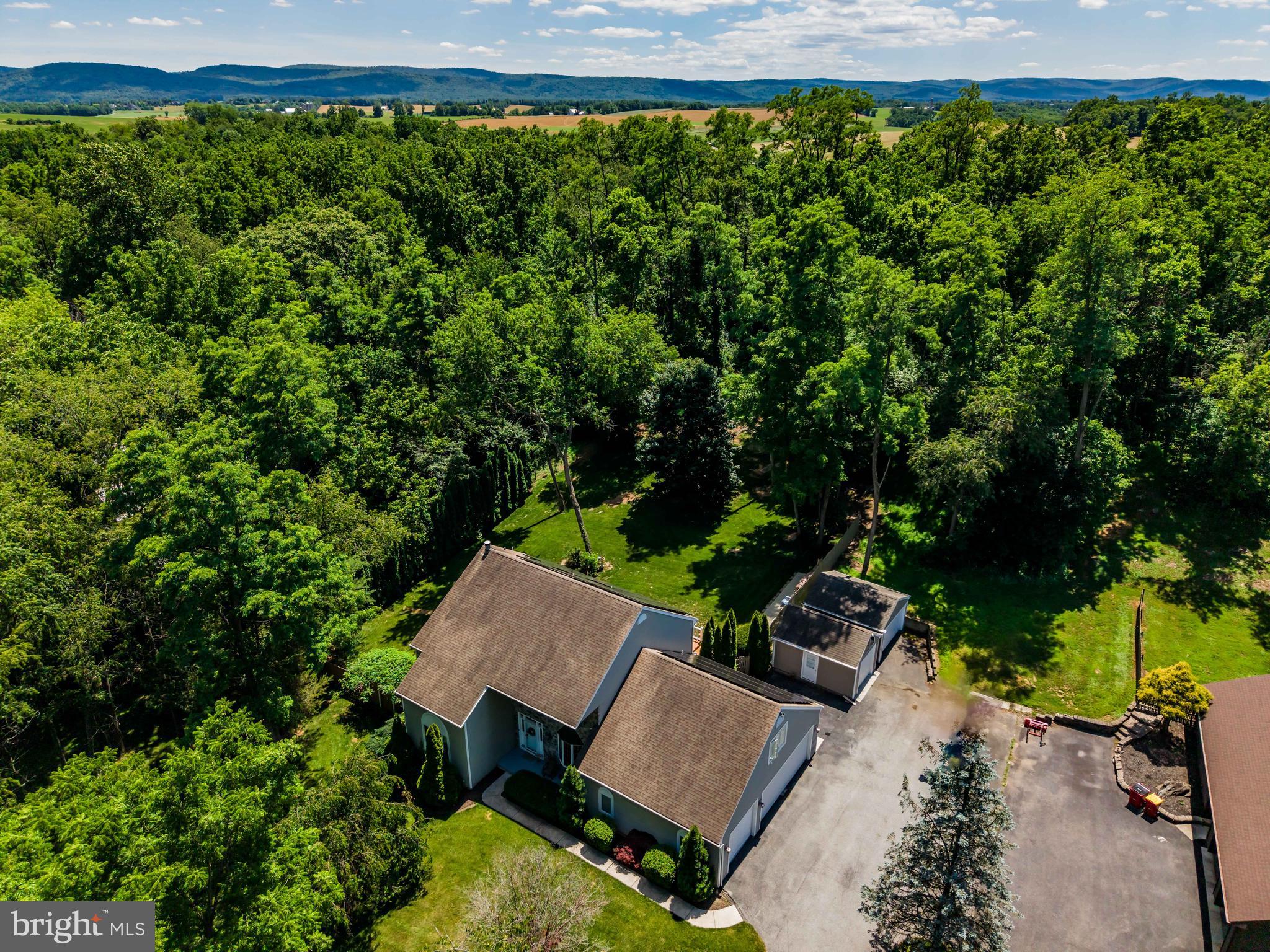 176 Richland Road Carlisle, PA 17015 - Photo 52 of 59 an aerial view of a house with a yard basket ball court and outdoor seating