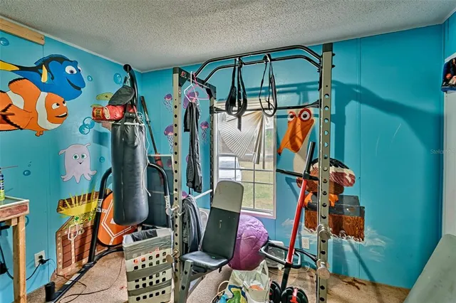 a bathroom with a sink a mirror and a shower