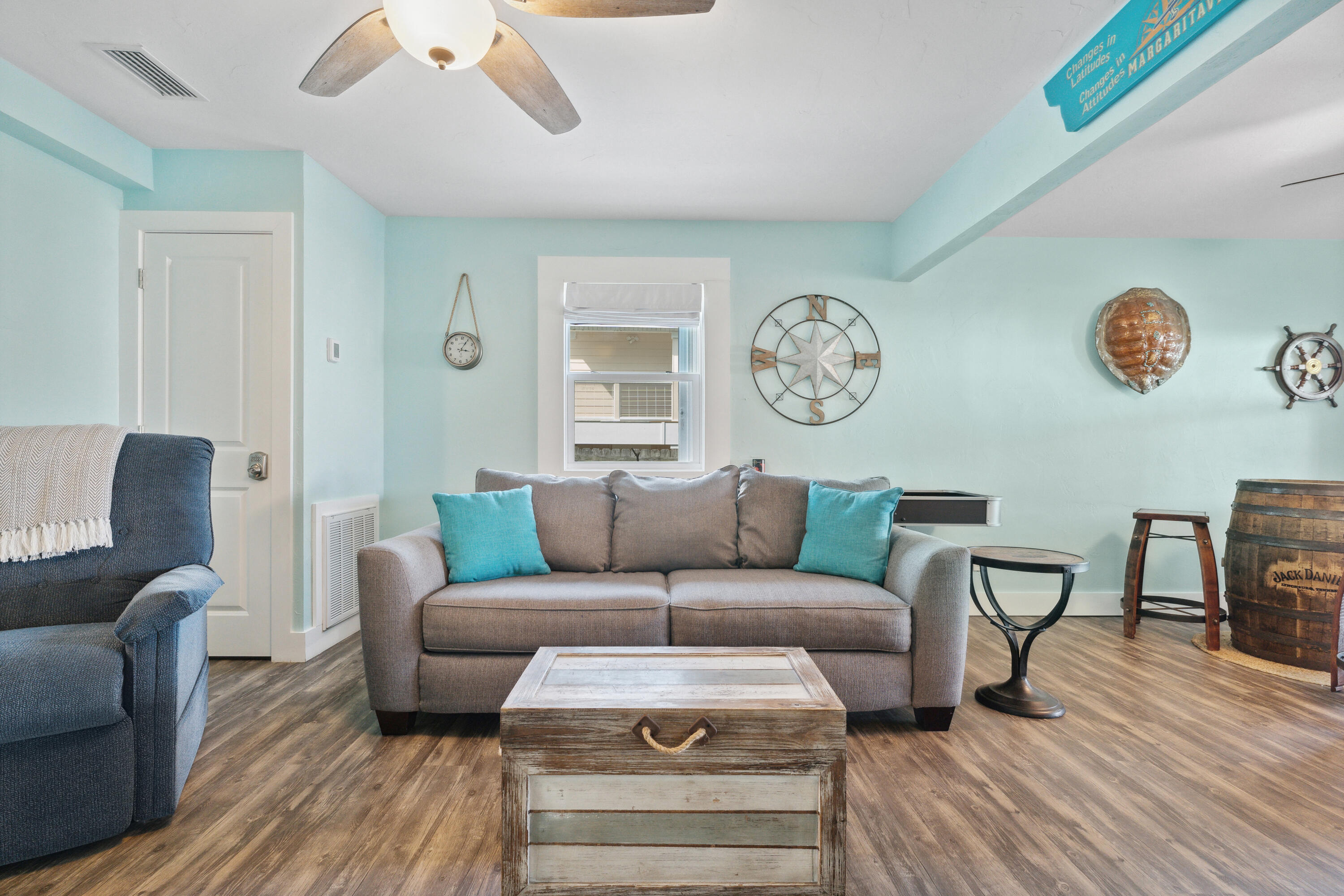 129 Durango Road, Unit 1 Destin, FL 32541 - Photo 17 of 71 a living room with furniture and a wooden floor