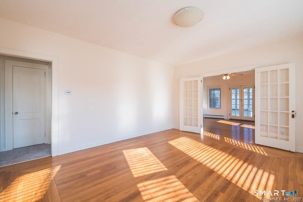 2 Pleasant Street, Unit 2 Windsor Locks, CT 06096 - Photo 5 of 11 a view of a room with cabinet and windows