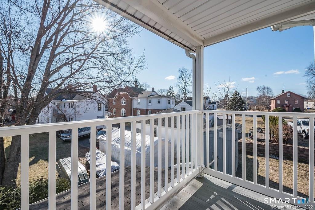 2 Pleasant Street, Unit 2 Windsor Locks, CT 06096 - Photo 8 of 11 a view of a balcony with an outdoor space