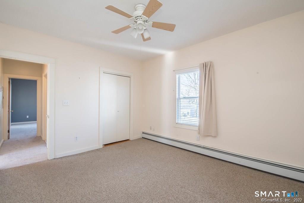 2 Pleasant Street, Unit 2 Windsor Locks, CT 06096 - Photo 10 of 11 a view of an empty room with a window