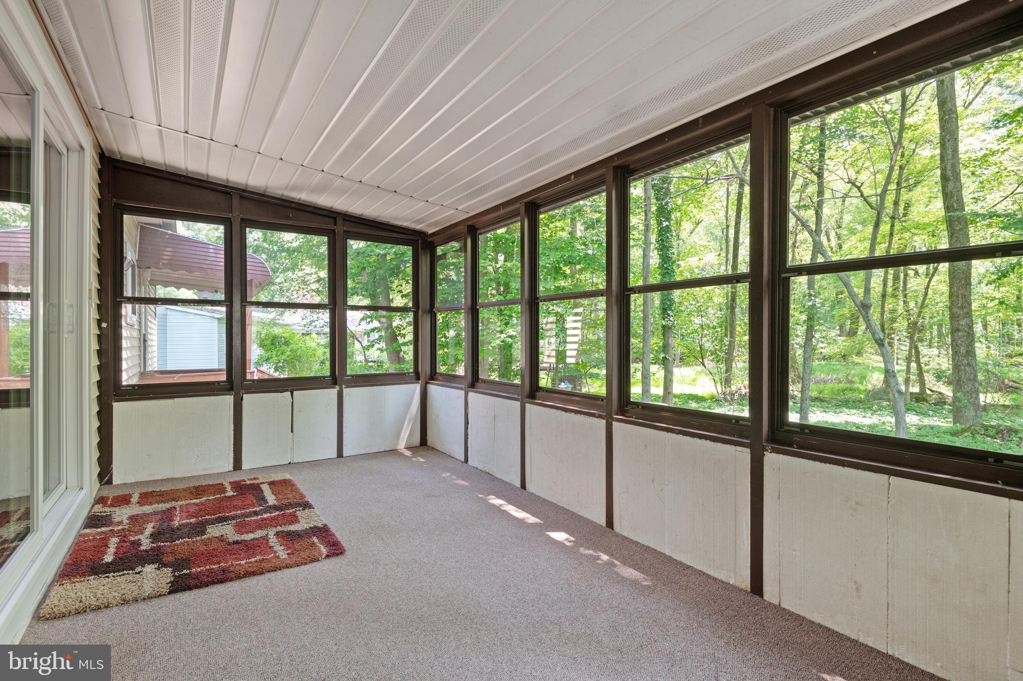 61 Maple Avenue Manheim, PA 17545 - Photo 29 of 40 Enjoy nature from the comfort of an enclosed patio