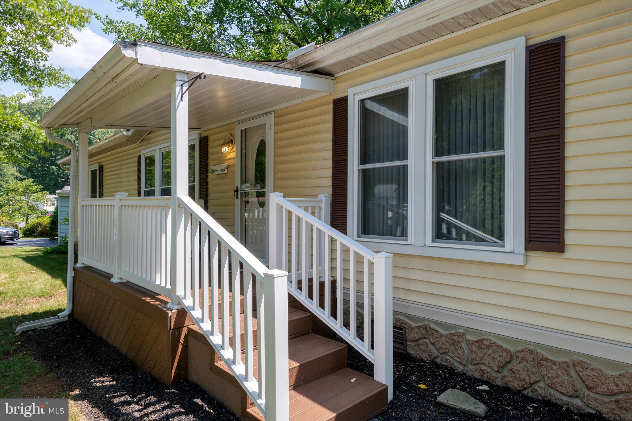 61 Maple Avenue Manheim, PA 17545 - Photo 3 of 40 Step onto the covered porch and enjoy your tour!