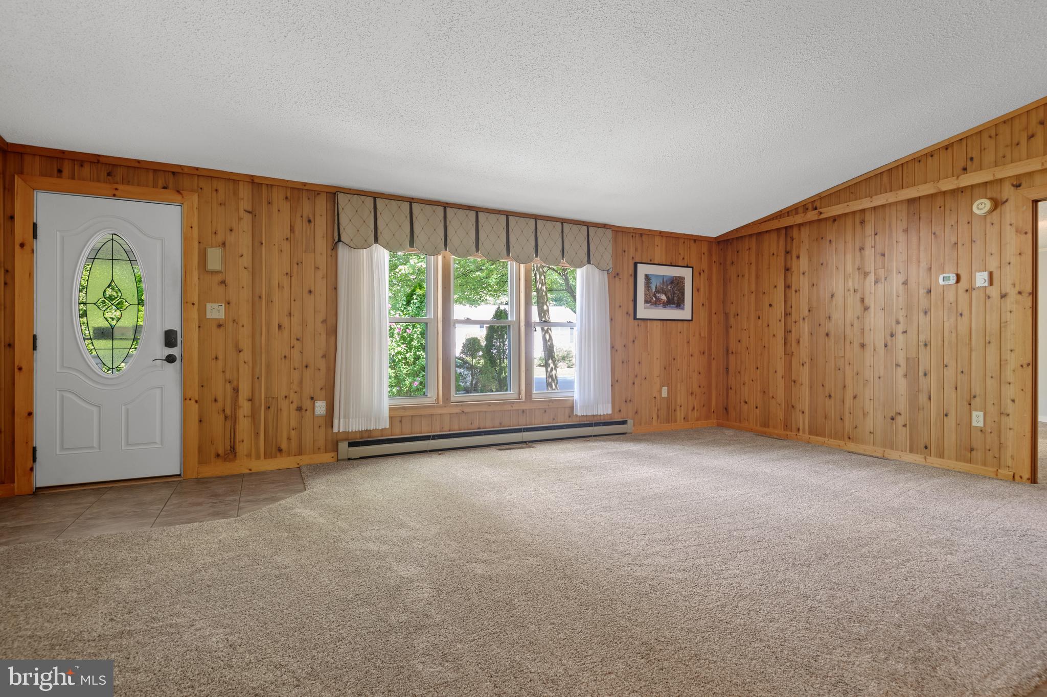 61 Maple Avenue Manheim, PA 17545 - Photo 8 of 40 Knotty pine make this room feel like a cozy cabin