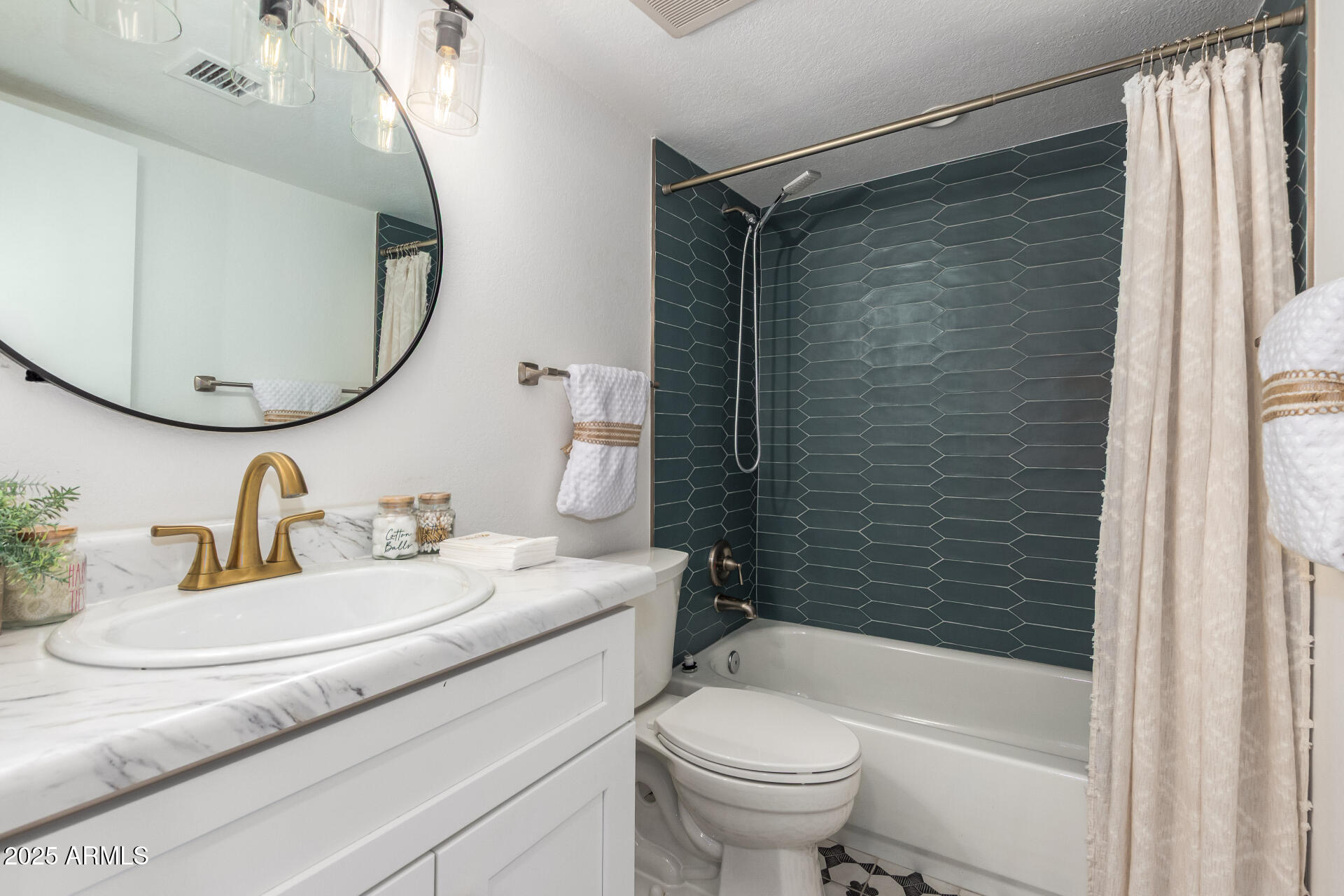 7430 East Chaparral Road, Unit 245A Scottsdale, AZ 85250 - Photo 17 of 30 a bathroom with a sink toilet and shower