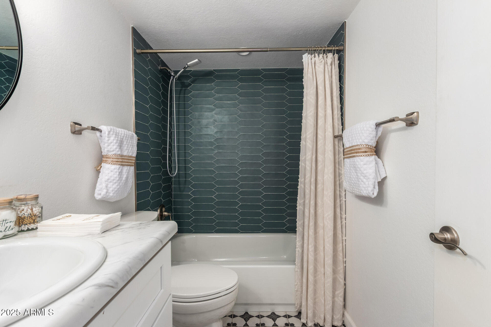 7430 East Chaparral Road, Unit 245A Scottsdale, AZ 85250 - Photo 18 of 30 a bathroom with a shower a toilet and sink