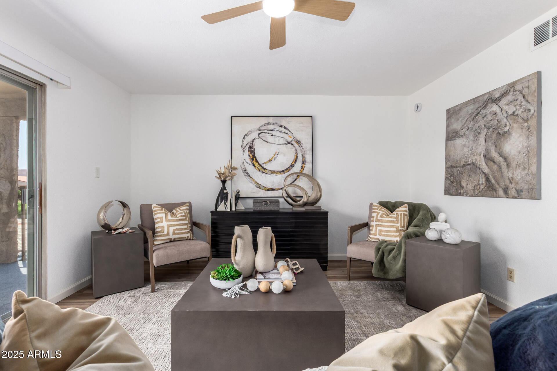 7430 East Chaparral Road, Unit 245A Scottsdale, AZ 85250 - Photo 2 of 30 a living room with furniture and a fireplace