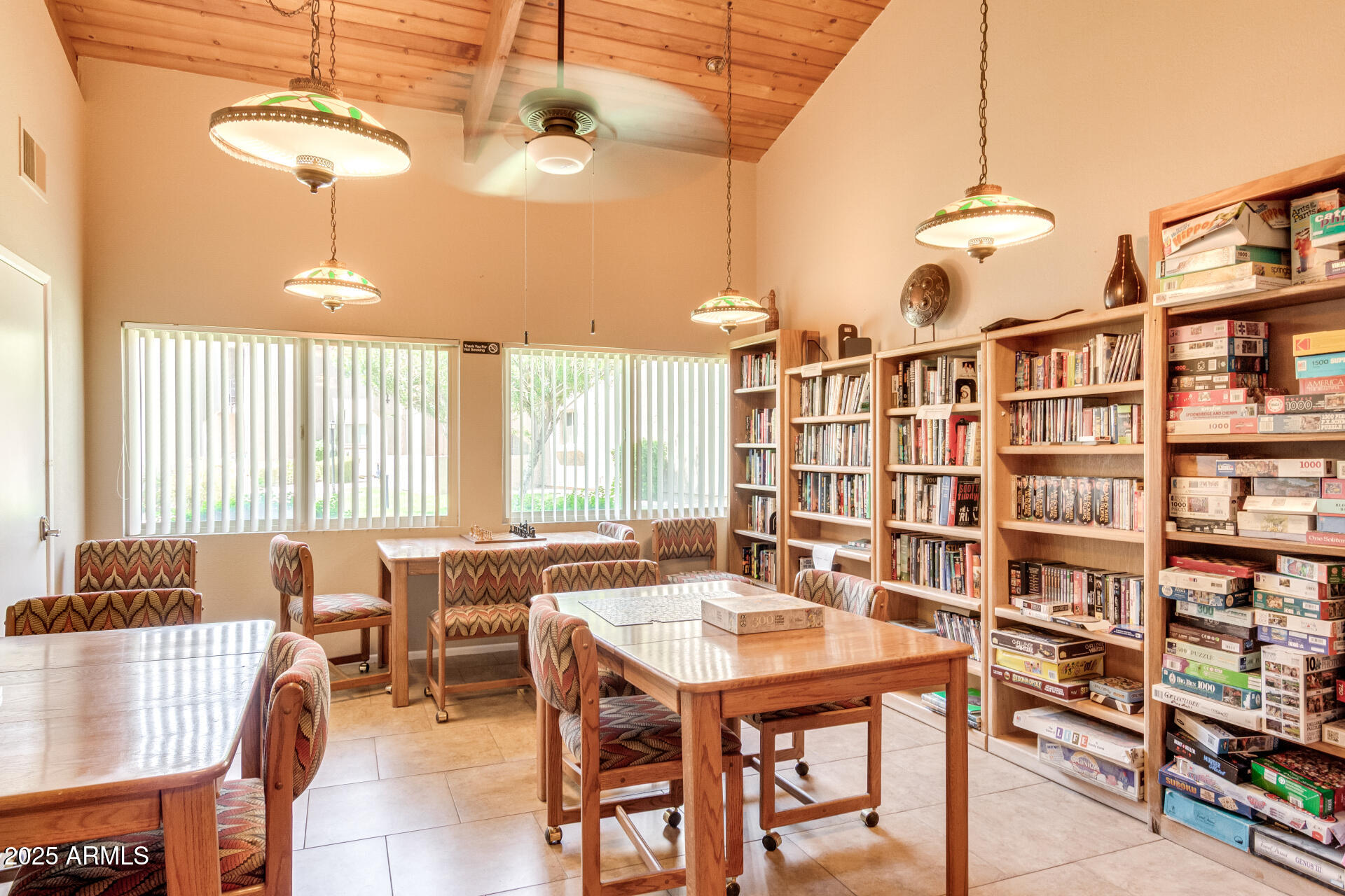 7430 East Chaparral Road, Unit 245A Scottsdale, AZ 85250 - Photo 25 of 30 a dining room with furniture and a chandelier