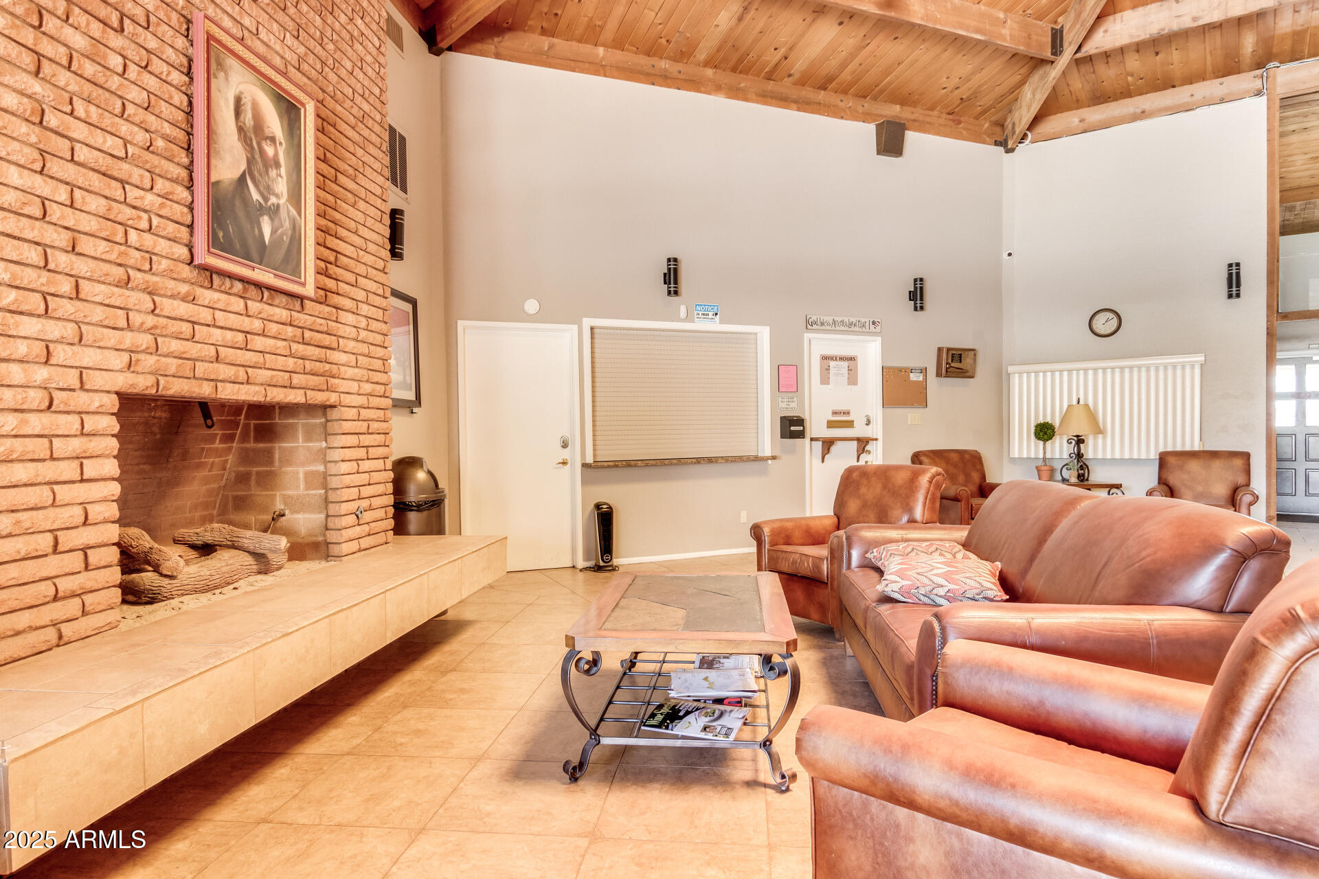 7430 East Chaparral Road, Unit 245A Scottsdale, AZ 85250 - Photo 26 of 30 a living room with furniture and a fireplace