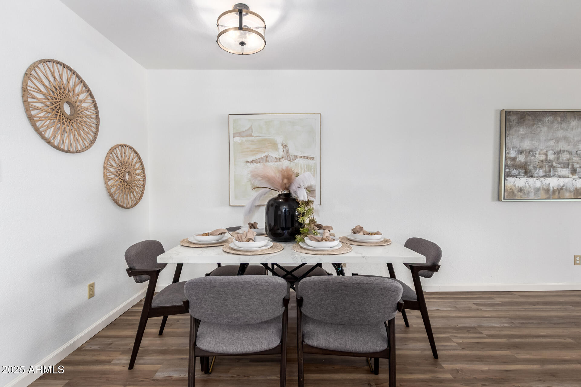 7430 East Chaparral Road, Unit 245A Scottsdale, AZ 85250 - Photo 7 of 30 a view of a dining room with furniture and wooden floor