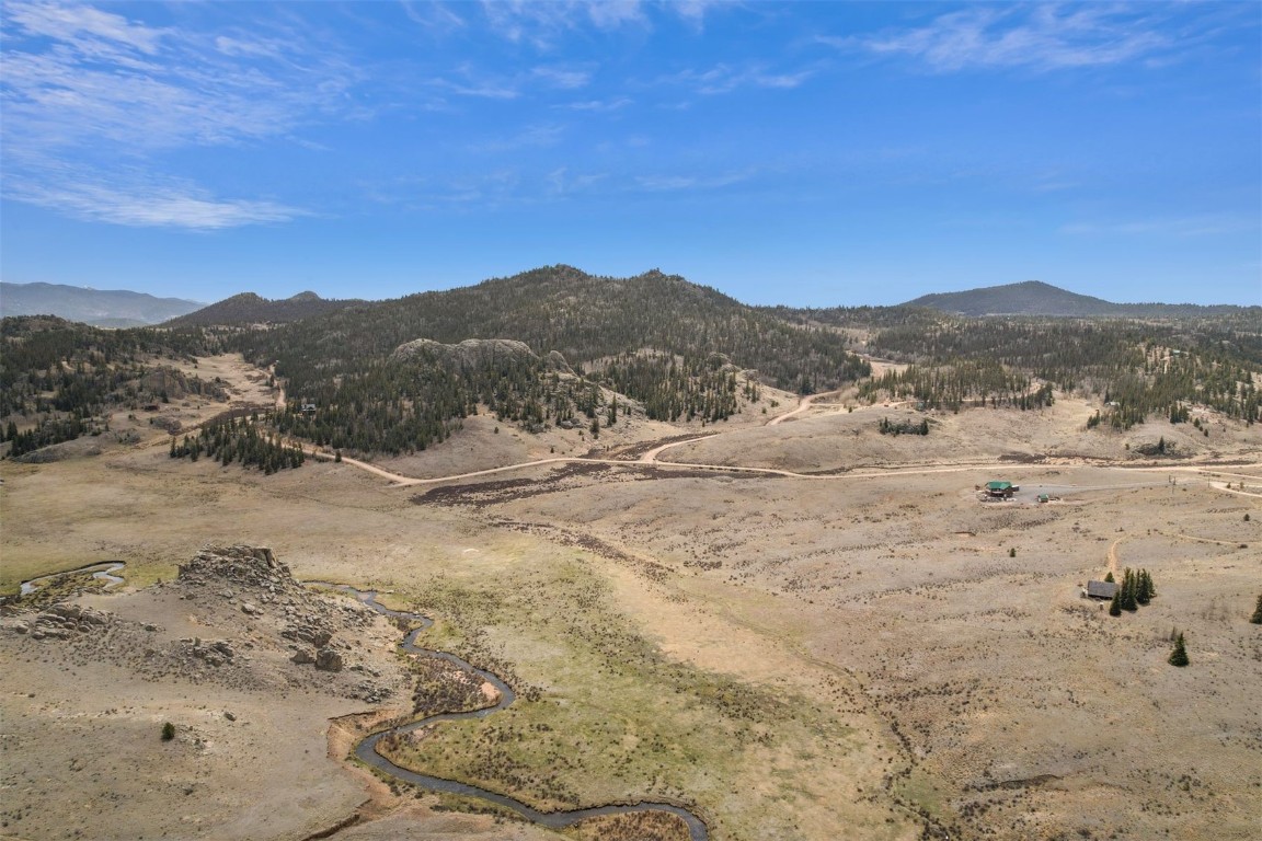 2131 Travois Road Jefferson, CO 80456 - Photo 15 of 23 a view of a dry yard with green space