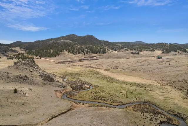 a view of ocean and mountain