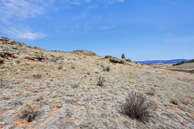 a view of lake and mountain