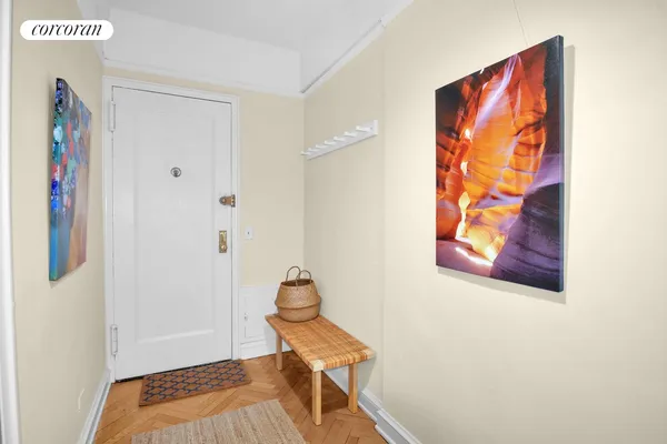 a bathroom with a toilet and a shower curtain