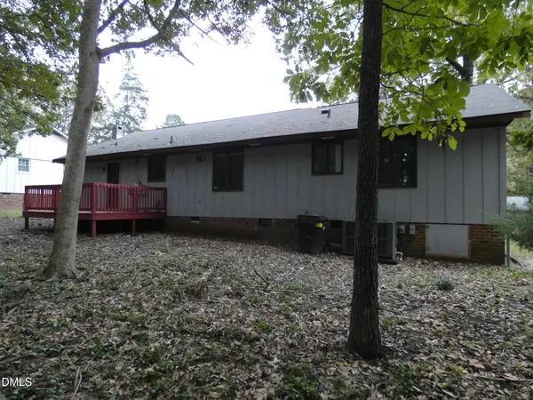 a house view with a backyard space